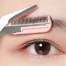 Pink eyebrow trimming scissors with built-in comb